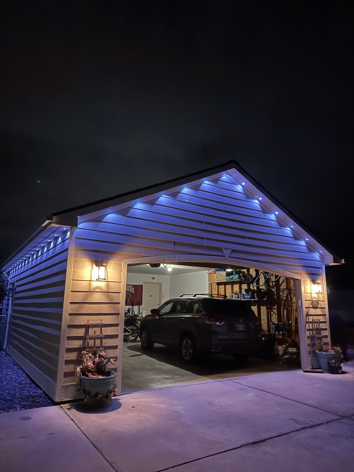 Blue roofline over a detached garage by Montana Lights
